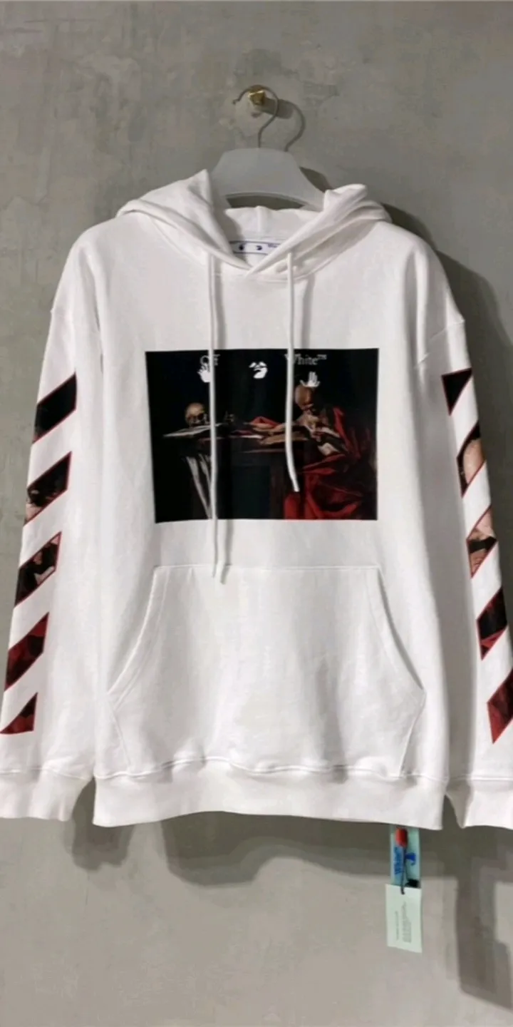 Real shot of the video - top tested version OFFWHITE OW Caravaggio Skeleton Old Man Oil Painting for Male and Female Couples Pure Cotton Loose Religious Round Neck Pullover Hoodie Sweatshirt Exclusive version on the market, zp's sales once hit a new high. Both the front and rear panels are printed using Kornit's digital direct printing process, with 7 colors sprayed and glazed solid film, giving the printing a jelly-like feel. The printing gradient is gentle, the texture is clear, and the color contrast is obvious. The fabric is made of 480g large fish scale pure cotton terry fabric, which is launched in a big way and has full drape. It can be compared with all versions on the market and is synchronized. Brand new 21s collar label, washed, hang tag, all customized. Size chart
